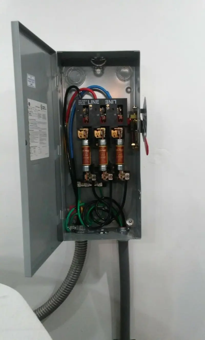 Three-phase disconnect switch installed for Smoke Detector Installation in Elroy